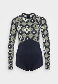 Langermet badedrakt med blomsterdesign i grønn og marineblå, med ensfarget marineblå bunn, glatt tekstur og sporty design.
