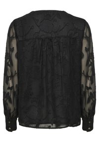 Sort gennemsigtig bluse med blomsterbroderi, lange ærmer, samlet ryg og knaplukning ved håndleddene. Den strukturerede stof giver dybde til designet.