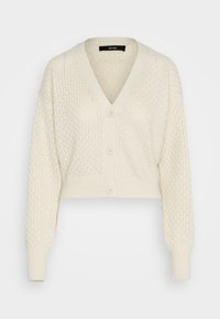 Korta stickade koftan i off-white med V-ringning, tre knappar, långa ärmar och texturmönster genom hela plagget.