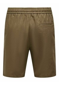 Braune Shorts aus weichem Stoff mit elastischem Bund, ausgestattet mit einer Gesäßtasche und einer glatten Textur.