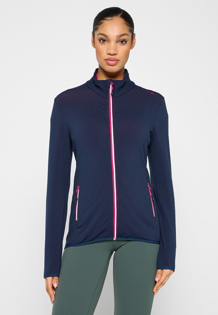 Veste zippée bleu marine avec des accents roses, dotée d'un col montant, d'un tissu texturé et de deux poches avant zippées.