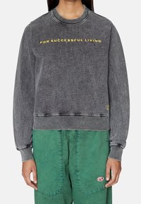 Gray sweatshirt with a ribbed collar and cuffs, featuring yellow embroidered text "FOR SUCCESSFUL LIVING" across the chest.