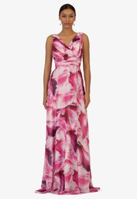 Maxikleid aus pinkfarbener, transparenter Stoff mit mutigem Blumendesign; V-Ausschnitt und taillierter Oberteil; fließender Rock mit schichtiger Textur.