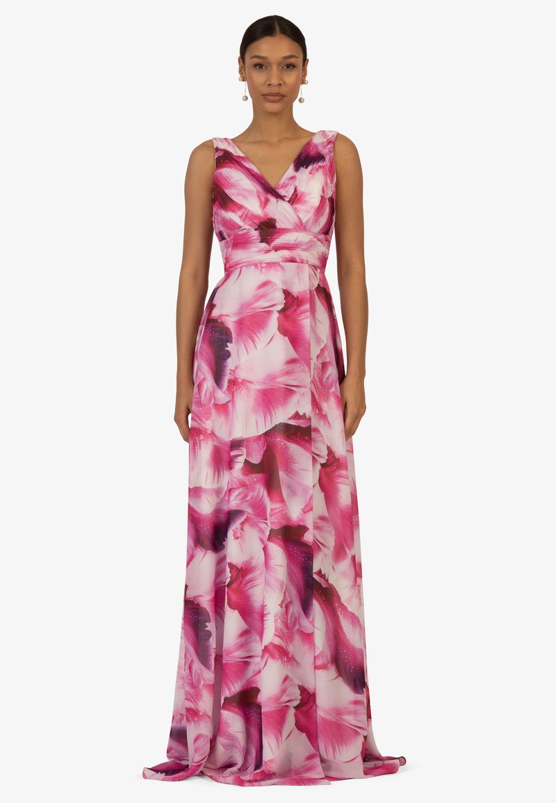 Maxikleid aus pinkfarbener, transparenter Stoff mit mutigem Blumendesign; V-Ausschnitt und taillierter Oberteil; fließender Rock mit schichtiger Textur.