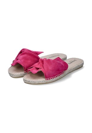 Pink suede slide sandals with a front knot design and woven jute midsoles, featuring a smooth texture and open toe style.