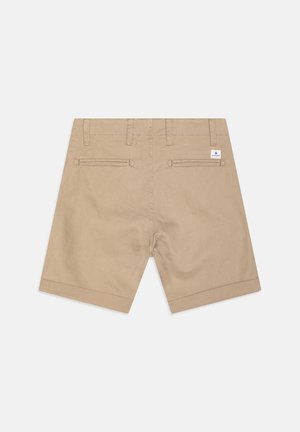 Pantalones cortos beige fabricados con una mezcla de algodón, que presentan un diseño de frente plano, dos bolsillos traseros y dobladillo vuelto. Incluye una pequeña etiqueta de marca en la parte posterior.