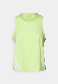 Lichtgroene Adidas tanktop van synthetisch materiaal, met een racerback design en witte diagonale strepen aan de zijkanten.