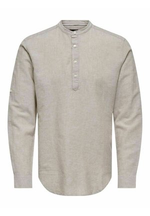 Light beige long-sleeve shirt made of linen with a round neckline, button placket, and rounded hem; features subtle texture.