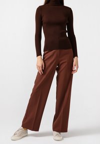 Touché Privé Sweter