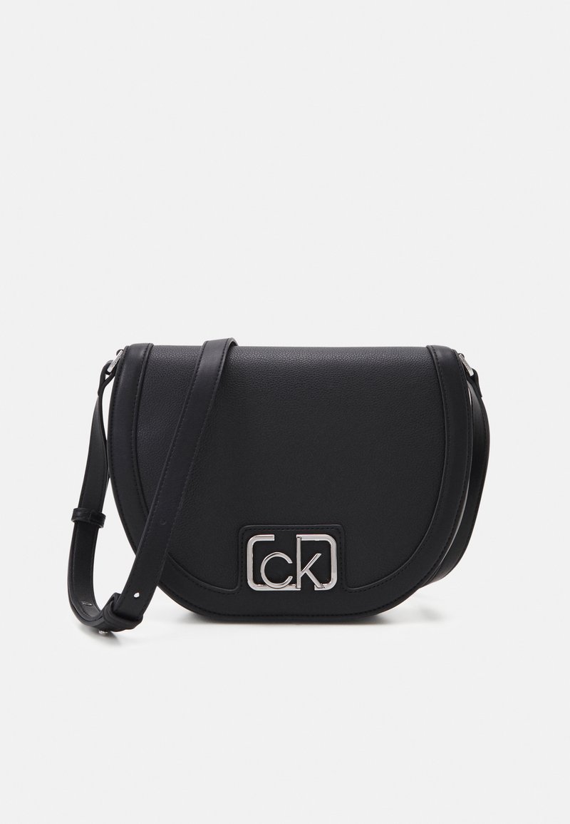 Calvin Klein SADDLE BAG Sac bandoulière black/noir ZALANDO.BE