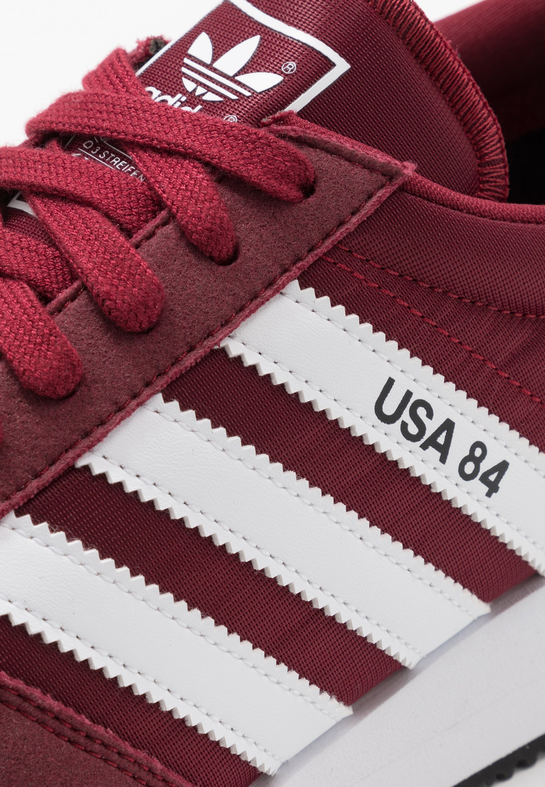 adidas burgundy and blue trainers