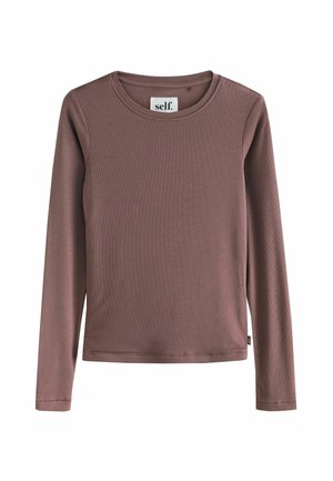 Langarmshirt in gedämpftem Mauve, aus geripptem Stoff. Hat einen runden Ausschnitt und ein kleines Etikett an der Seitennaht.