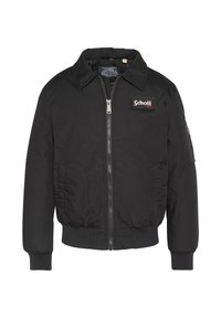 Sort bomberjakke lavet af glat stof, med en frontlynlås, ribbede manchetter og et logopatch på venstre bryst. Standard pasform.
