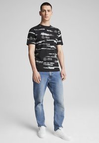 Puma MERCEDES-AMG PETRONAS F1® LOGO - T-shirt med print - black