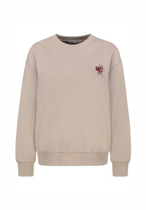 Beige sweatshirt met een ronde halslijn en lange mouwen. Heeft een kleine rode en roze geborduurde roos op de linkerborst. Gladde textuur.