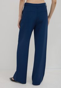 Calliope A PALAZZO - Pantaloni - blu