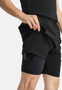 Formbelt 2-IN-1 - Jogginghose - schwarz