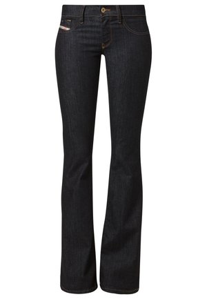 Donkerblauwe denim flared jeans met een ritssluiting en knoopsluiting. Bevat vijf zakken en subtiele stikselaccenten. Soepele textuur.