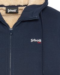 Sudadera con cremallera color navy con interior de forro polar texturizado, que presenta un logo de Schott en blanco y rojo, y capucha con cordones. Acabado de tela suave.