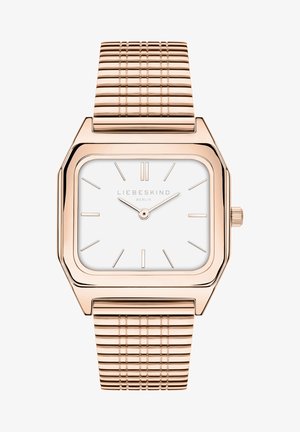 Rosaguld armbåndsur med firkantet urkasse, hvid urskive, minimalistiske timeindikatorer og tekstureret metalrem. Brandnavnet er synligt på urskiven.