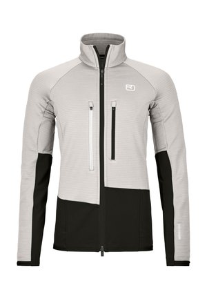 Hellgraue und schwarze Jacke mit Reißverschluss, hohem Kragen, zwei vertikalen Brusttaschen und kontrastierenden Ärmeln.