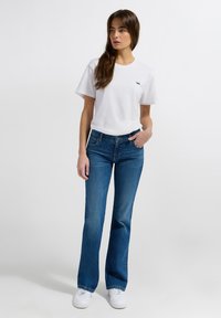 Lee JESSICA - Kavbojke na zvonec - stone blue denim