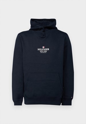 Navy blauwe hoodie met voorzak en de tekst "Hilfiger New York Established 1985" en logo op de borst, geribbelde boorden en tailleband.