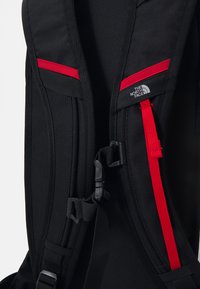 The North Face SLACKPACK 2.0 UNISEX - Sac de randonnée - black/red