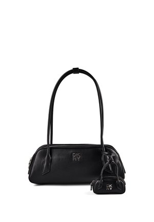 Black DKNY handbag with long handles and matching smaller pouch attached, both featuring silver logo and zipper details on a white background.