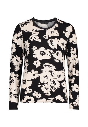 Długi rękaw, bluzka w czarno-kremowy kwiatowy wzór, wykonana z miękkiego materiału, z okrągłym dekoltem i luźnym krojem.