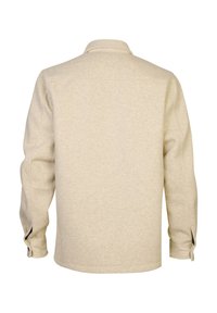 Beige cotton shirt jacket with a collared neck, long sleeves, and buttoned cuffs. Smooth texture, casual fit, and plain design.