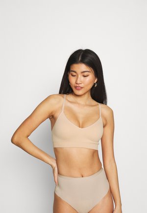 REVIVE - Alustoppi - beige