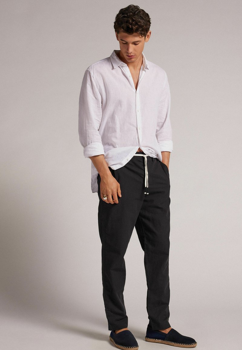 IUMAN Intimissimi Uomo Pantaloni schwarz black/nero Zalando