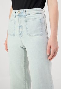Good American PALAZZO  - Τζιν Bootcut - blue denim