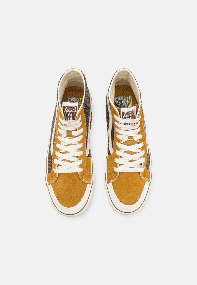 brown and yellow vans