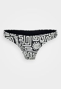 Parte inferior de bikini en blanco y negro con patrones geométricos y un motivo de sol. Fabricada con tejido texturizado, presenta un diseño de tiro bajo y bordes curvados.