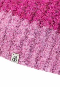 Textured pink fabric featuring a gradient from dark to light shades. Includes a small label with a graphic logo in the bottom corner.