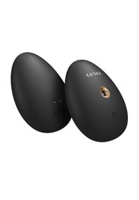 Dispositif ergonomique noir en forme d'œuf, avec un accent doré et de petits boutons, un fini matte lisse et une marque visible.