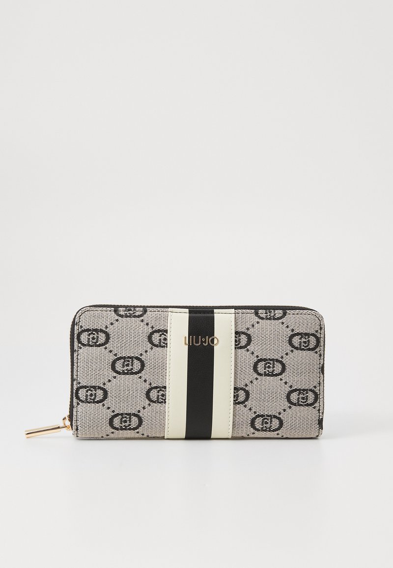 Zip-around wallet made of patterned fabric in grey and black, featuring a gold logo, black and white stripes, and a polished hardware accent.