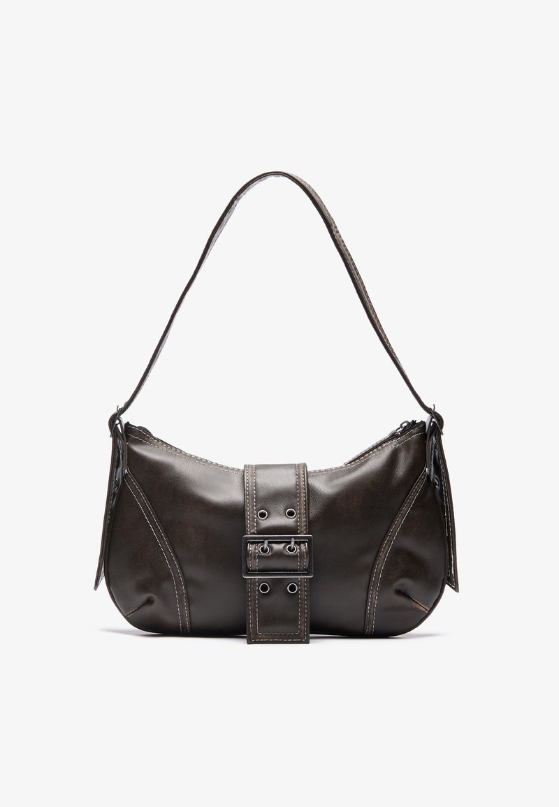 Brown leather shoulder bag with a curved shape, featuring a prominent buckle detail, contrasting stitching, and a single shoulder strap.