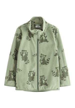 Veste polaire vert clair avec fermeture éclair intégrale à l'avant et motifs ratons laveurs vert foncé sur tout le tissu.