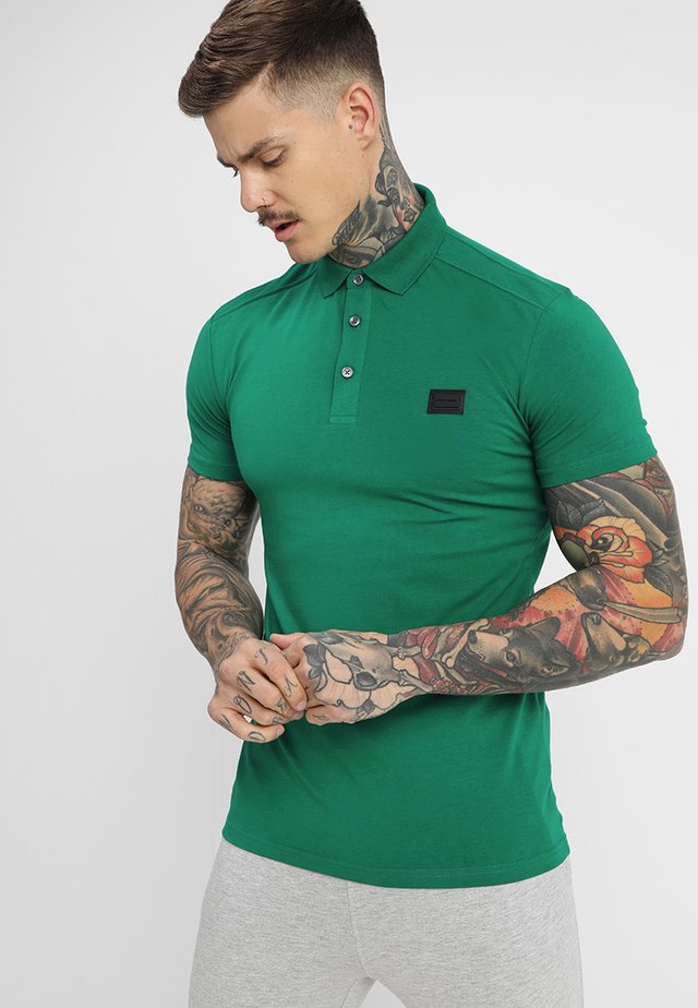SPORT PLAQUETTE - Poloshirt - verde