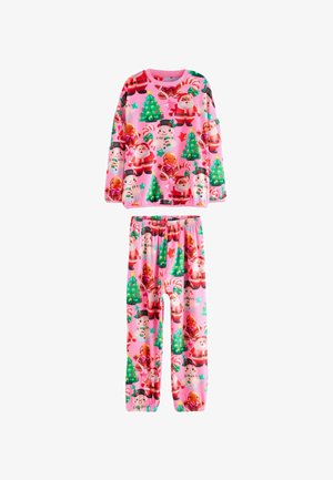 Christmas-themed pajama set in soft pink fabric, featuring patterns of Santa, gingerbread men, candy canes, and Christmas trees.