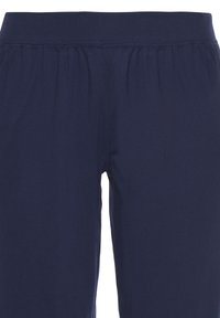 Navy blue cotton blend pants with an elastic waistband, featuring a smooth texture and loose fit. No visible patterns or hardware details.