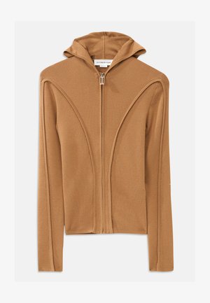 Hoodie castanho com fecho zip, com capuz, feito de tecido macio, apresentando costuras curvas e um fecho frontal.