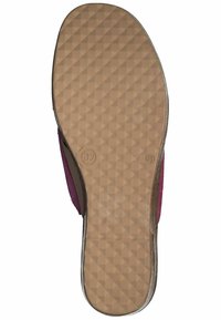 Suola della scarpa in gomma marrone testurizzata con un motivo a diamante. I bordi sono accentuati da un materiale superiore di colore viola. Taglia 37 indicata.
