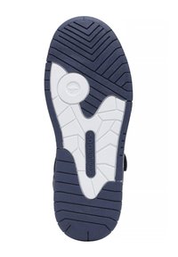 Navy sneaker sole with white rubber accents, textured grip patterns, and a circular logo detail. Features zigzag and rectangular tread design.
