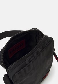 HUGO ETHON ZIP UNSEX - Cross body bag - black
