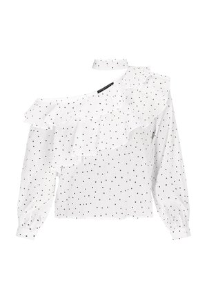 White blouse with black polka dots, featuring ruffles on one shoulder, long puff sleeves, and a high neck design. Lightweight fabric.