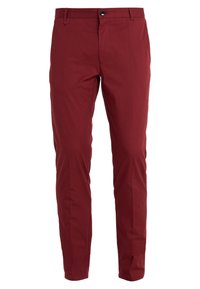 Pantalons ajustés rouges en tissu lisse. Dotés d'une fermeture éclair, d'un bouton et de deux poches latérales pour un look épuré.